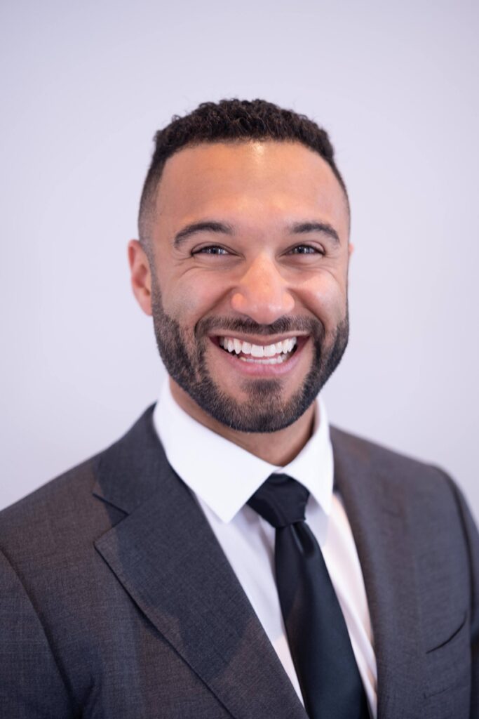 A professional headshot of Coach John Marshall, Founder of Coaching Business Launchpad